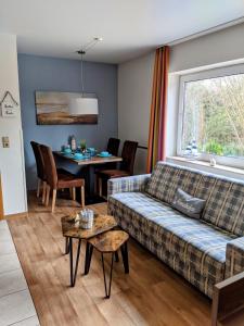 Khu vực ghế ngồi tại Ferienwohnungen Am Grooten Steen 16