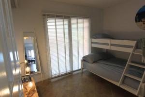 Voodi või voodid majutusasutuse Appartement Lora Jan Thiel Curacao toas
