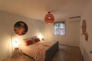 Voodi või voodid majutusasutuse Appartement Lora Jan Thiel Curacao toas