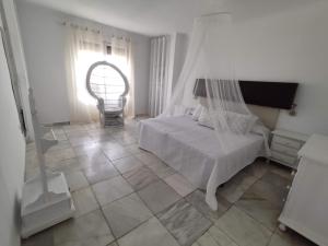 Posteľ alebo postele v izbe v ubytovaní Casa Rural La Promesa Granada
