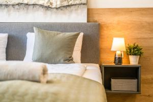 Posteľ alebo postele v izbe v ubytovaní MyFlat Coral Premium Suite
