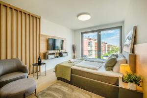 Posteľ alebo postele v izbe v ubytovaní MyFlat Coral Premium Suite