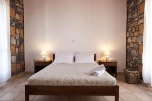 A bed or beds in a room at Io