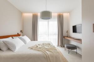 Postel nebo postele na pokoji v ubytování Villa Scala