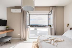 Postel nebo postele na pokoji v ubytování Villa Scala