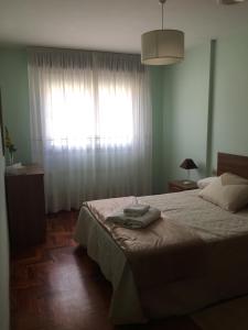 Posteľ alebo postele v izbe v ubytovaní PASEO DO MACEIRAS