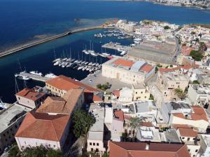 an aerial view of a town with boats in the water at Ariadne Luxury Home in Chania Town