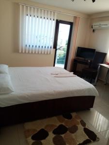 Postel nebo postele na pokoji v ubytování Casa Andu