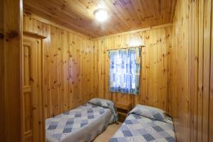 Postel nebo postele na pokoji v ubytování Camping Gironella + 37 fotografií