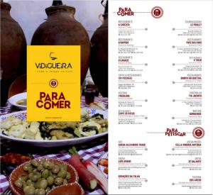 een pagina van een menu voor een pizzahoek bij Casa da Matriz in Vidigueira