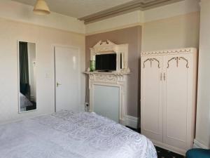 Postel nebo postele na pokoji v ubytování Athol Park Guest House