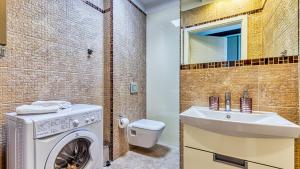 Kúpeľňa v ubytovaní Apartament Maki - 5D Apartamenty
