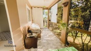 Φωτογραφία από το άλμπουμ του Casinha aconchegante bem perto da praia | MAAL04 σε Imbetiba