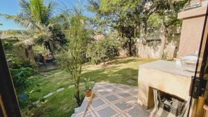 Φωτογραφία από το άλμπουμ του Casinha aconchegante bem perto da praia | MAAL04 σε Imbetiba