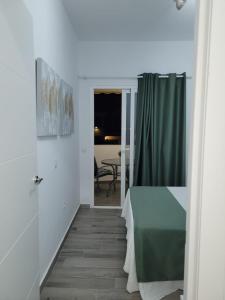 Ein Bett oder Betten in einem Zimmer der Unterkunft Heva Home