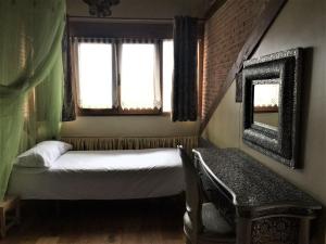 A bed or beds in a room at Camino a Casa - Suances