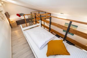 a small room with two bunk beds in it at Villa Aurelia in Zadar