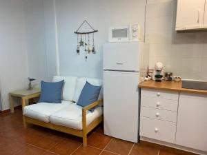 Kuchyň nebo kuchyňský kout v ubytování Centrico apartamento con piscina