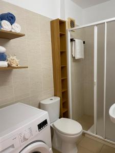 Koupelna v ubytování Centrico apartamento con piscina