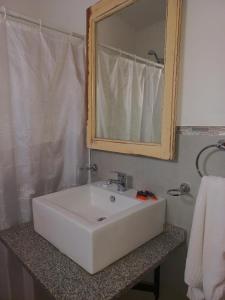 Ванная комната в Posada Faro Serrano