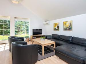 TV a/nebo společenská místnost v ubytování Holiday home Toftlund XLII