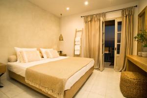 Ein Bett oder Betten in einem Zimmer der Unterkunft Horizon Hotel Kalymnos