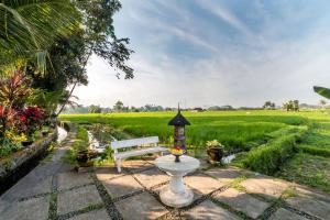 Ein Garten an der Unterkunft Umasari Rice Terrace Villa by AGATA