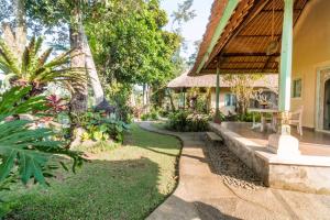 Ein Garten an der Unterkunft Umasari Rice Terrace Villa by AGATA