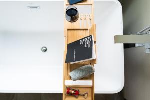 a shelf in a room next to a bed at Amorcito de Jenny - Shared House in Portland