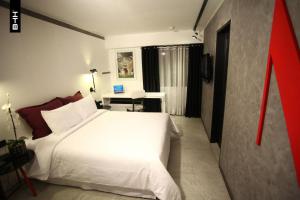 Katil atau katil-katil dalam bilik di BTH Hotel – Boutique Concept