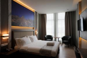 Postel nebo postele na pokoji v ubytování Hotel 17 + 37 fotografií