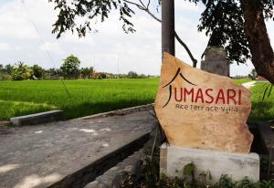 Ein Zertifikat, Auszeichnung, Logo oder anderes Dokument, das in der Unterkunft Umasari Rice Terrace Villa by AGATA ausgestellt ist