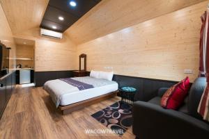 Postel nebo postele na pokoji v ubytování Xiaoliuqiu Happy House B&B