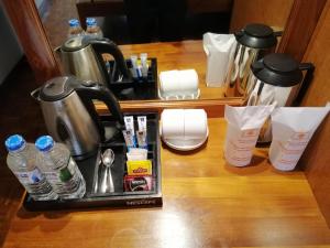 Set per la preparazione di tè e caffè presso Hotel Casamara