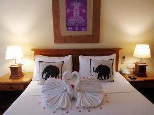 Letto o letti in una camera di Hotel Casamara