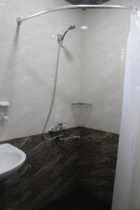 Baðherbergi á Hotel Rabati