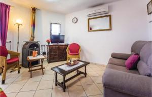 a living room with a couch and a table at Costa Nova in Jávea