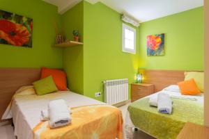 Posteľ alebo postele v izbe v ubytovaní Apartament Sant Antoni de Calonge