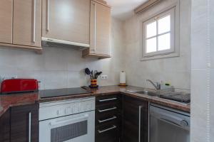 Kuchyňa alebo kuchynka v ubytovaní Apartament Sant Antoni de Calonge