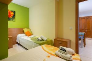 Posteľ alebo postele v izbe v ubytovaní Apartament Sant Antoni de Calonge