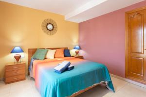 Posteľ alebo postele v izbe v ubytovaní Apartament Sant Antoni de Calonge