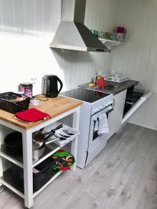 Кухня или кухненски бокс в MAYS Apartment