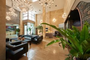 TV a/nebo společenská místnost v ubytování Gyeongju GG Tourist Hotel