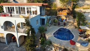an aerial view of a house with a swimming pool at Villa kaplumba in Dalyan