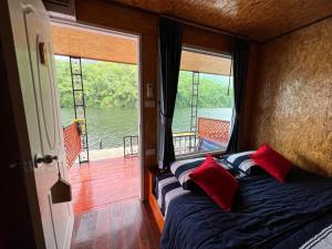 Postel nebo postele na pokoji v ubytování Phu Naphat Resort