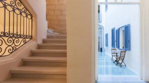 a staircase leading to the second floor of a house at AX The Saint John in Valletta