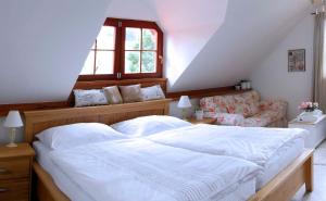 Postel nebo postele na pokoji v ubytování Penzion Rozmarýn