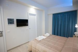 Katil atau katil-katil dalam bilik di B&B DELICIUS