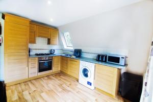 A kitchen or kitchenette at Lodges in Lanivet Cornwall with indoor pool