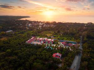 an aerial view of a house in the trees at Treat Beach Resort in Bordi
